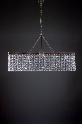 A glorious modern sparkling crystal chandelier creates an atmosphere, a ceiling lamp for every home, a table lamp and a general lamp.